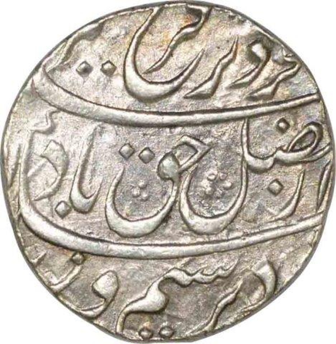 Silver One Rupee Coin of Farrukhsiyar of Out of Flan mint.