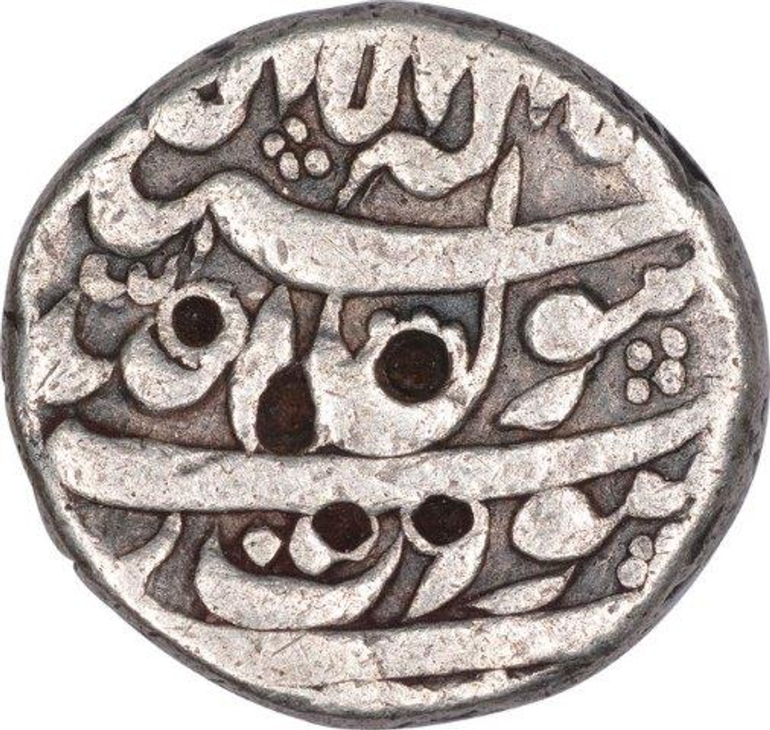 Silver Half Rupee Coin of Shah Jahan of Surat Mint.