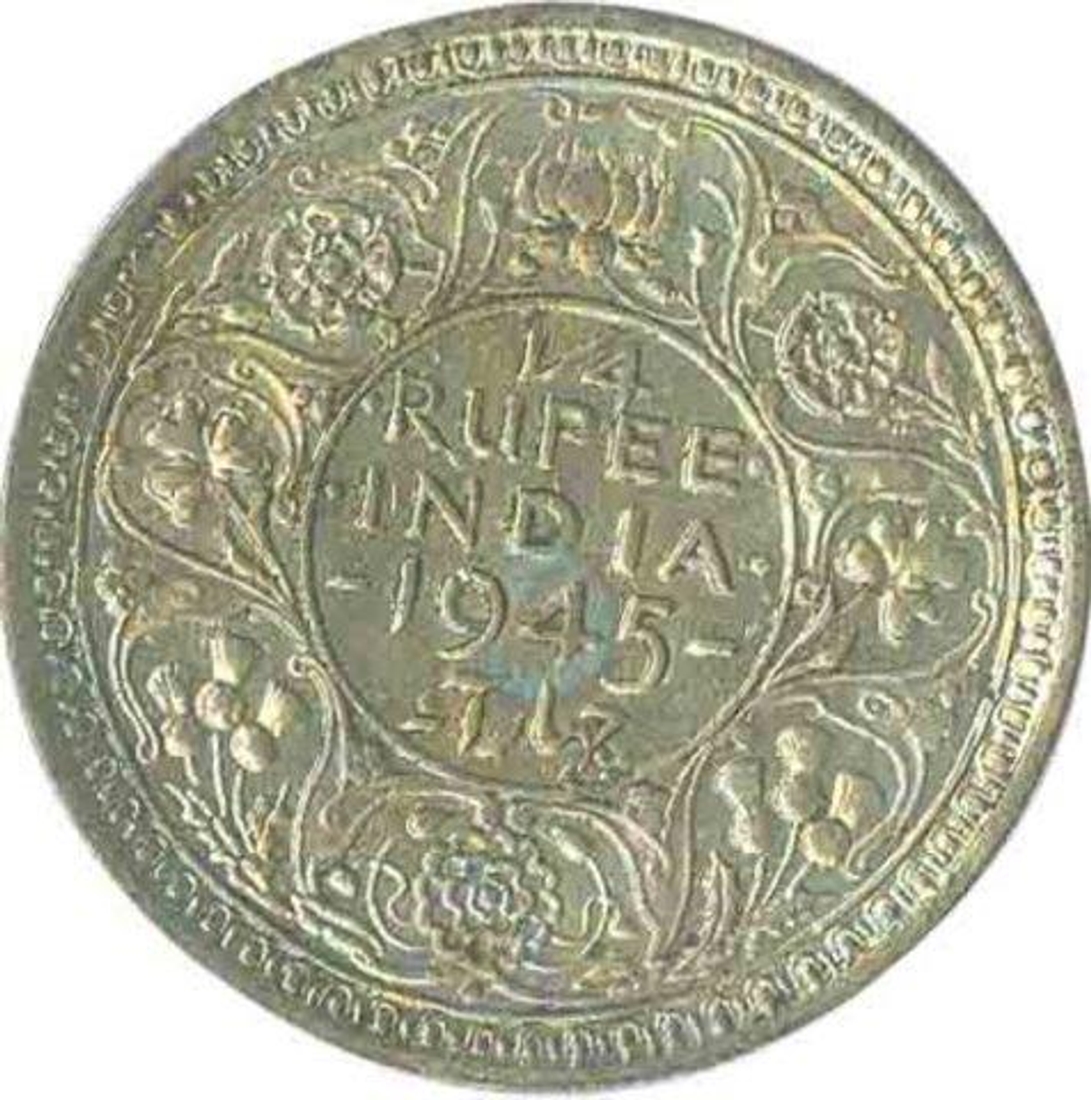 Silver Quarter Rupee of King George VI of Bombay Mint of 1945.