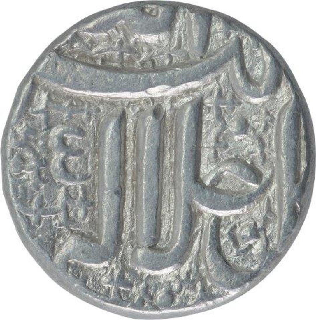 Silver One Rupee Coin of Akbar of Ahmadabad Mint of Farwardin Month. 