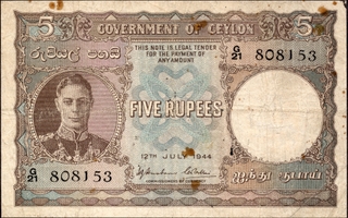 King George VI of Ceylon 1944 Five Rupees Banknote Signed by H J Huxham and C H Collins.