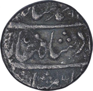 Silver One Rupee Coin of Muhammad Shah of Out of Flan Mint.