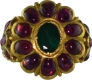 Ponderous Jadau Gold Ring brindled with phosphorescent Rubies and shimmering Emerald.