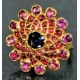 Gold Ring Studded with Red Burmese Rubies and Blue Sapphire.
