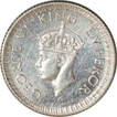 Silver Quarter Rupee Coin of King George VI of Calcutta Mint of 1943.