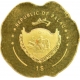 Gold one dollar red poppy flower coin of Palau.