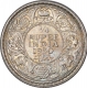 Silver Quarter Rupee Coin of King George V of Calcutta Mint of 1930.