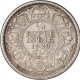 Silver Quarter Rupee Coin of King George V of Calcutta Mint of 1929.