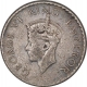 Silver Quarter Rupee Coin of King George VI of Calcutta Mint of 1940.