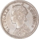 Silver Quarter Rupee Coin of Victoria Empress of Calcutta Mint of 1884.