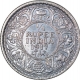 Silver Quarter Rupee Coin of  King George V of Calcutta Mint of 1917.