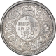 Silver Quarter Rupee Coin of King George V of Calcutta Mint of 1930.