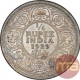 Silver Quarter Rupee Coin of King George V of Calcutta Mint of 1929.