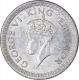 Silver Quarter Rupee Coin of King George VI of Calcutta Mint of 1942.