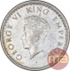 Silver Quarter Rupee Coin of King George VI of Calcutta Mint of 1939.