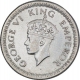 Silver Quarter Rupee Coin of King George VI of Calcutta Mint of 1942.