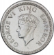 Silver Quarter Rupee Coin of King George VI of Calcutta Mint of 1942.