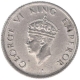 Nickel Quarter Rupee of King George VI of Bombay Mint of 1946.