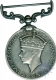 Silver Medal of King George VI of  For Long Service And Good Conducted India of 1938.