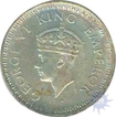 Silver Quarter Rupee of King George VI of Bombay Mint of 1945.