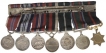 Miniature Medals of King George VI Queen Elizabeth II, and Pakistan.