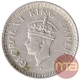 Silver One Quarter Rupee Coin of King George VI of Lahore Mint of 1945.