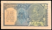 One Rupee Note of King George V signed by J.W. Kelly of 1935 E Prefix.