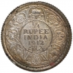 Silver Quarter Rupee Coin of King George V of Calcutta Mint of 1912.