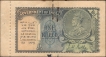  One Rupee Banknote of King George V Signed by J W Kelly of 1935 with booklet selvage. 