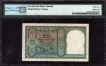  Extremely Rare PMG 64 EPQ  RED Serial Five Rupees Bank Note of King George VI Signed by C D Deshmukh of 1947. 