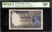 PMCS  Graded 50  AUNC Ten Rupees Banknote of King George V Signed by J W Kelly of 1935.