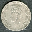 Silver Quarter Rupee of King George VI of Bombay Mint of 1943.