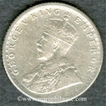 Silver Quarter Rupee of King George V of Calcutta Mint of 1918.